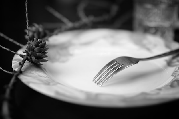 Foto vork in bord zwart wit