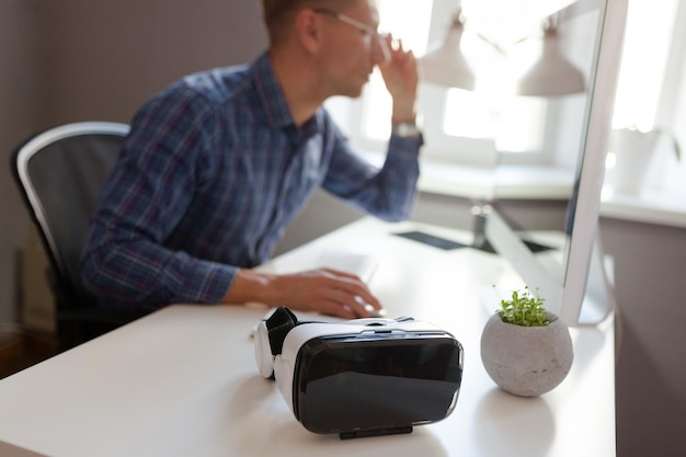 The VR goggles on the desk