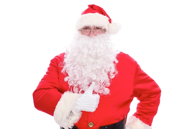 Vriendelijke Kerstman duim omhoog, geïsoleerd op een witte achtergrond.