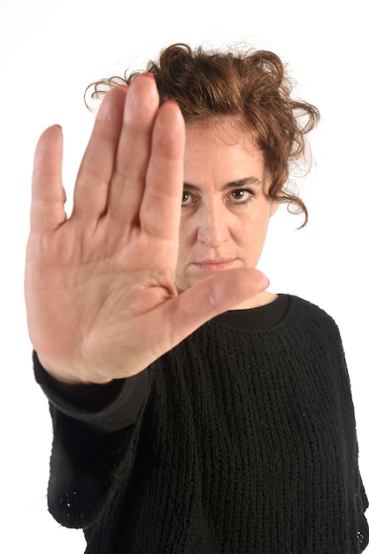 Vrouw die einde met haar hand doet