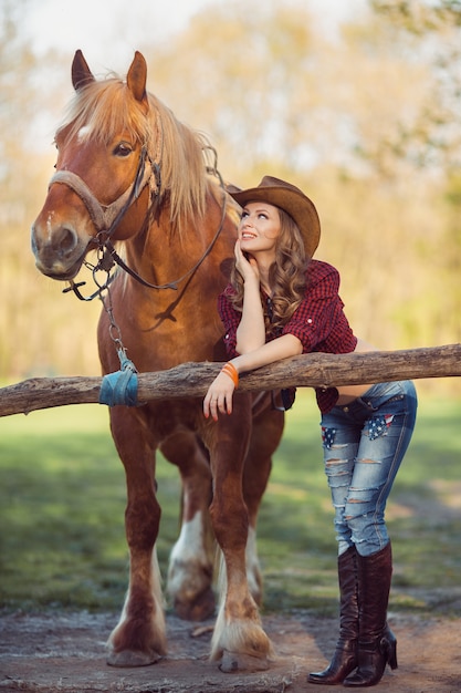 Vrouw en paard. Wild West Retro-stijl