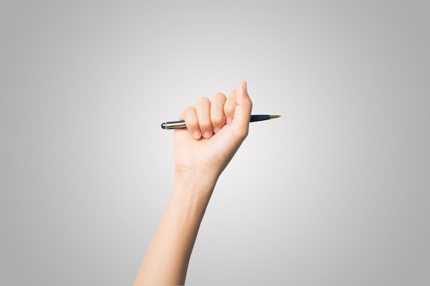 Vrouw hand met pennen geïsoleerd op een witte achtergrond.