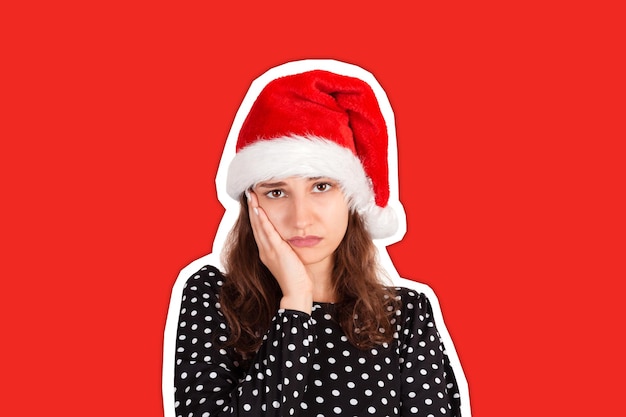 Vrouw in kerstmuts. Gelukkig nieuwjaarsconcept.