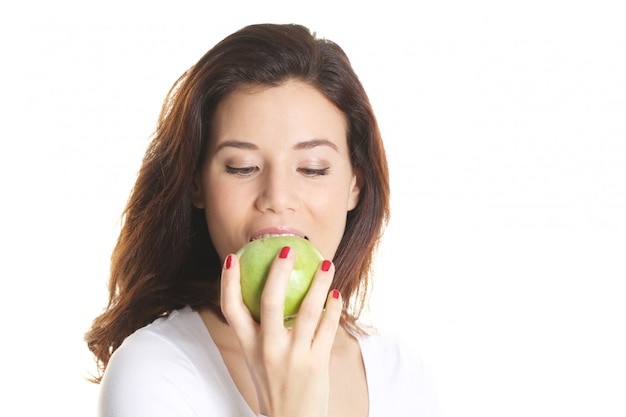 Vrouw met een groene appel