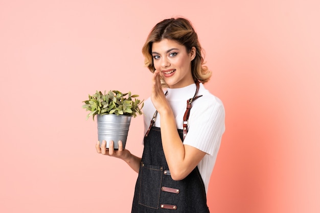 Vrouw met een plant in de studio