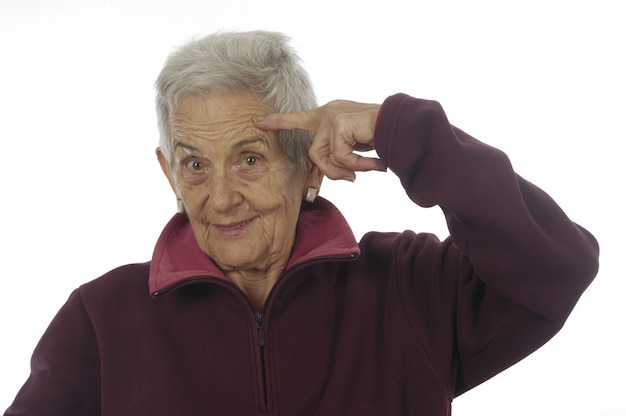 Foto vrouw met vinger op hoofd