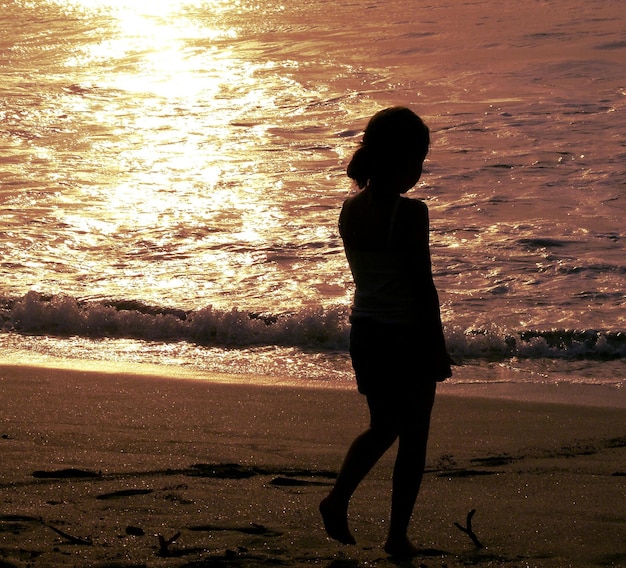 Vrouw op het strand.