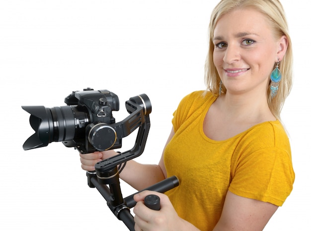 Vrouw videograaf met stabiele camera,