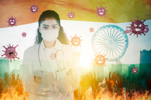 Vrouwelijke arts in gezichtsmasker die zich met de vlag van India bevinden