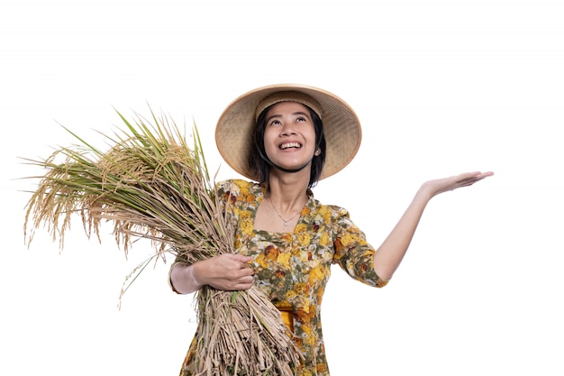 Vrouwelijke boer met rijstkorrels