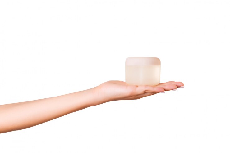 Vrouwelijke de lotionroom van de handholding
