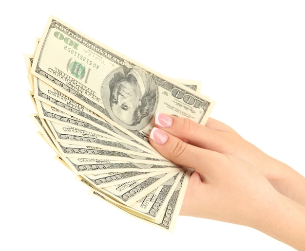 Vrouwelijke hand met dollars close-up geïsoleerd op white