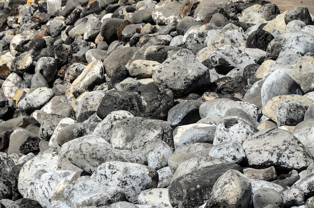 Vulkanische ronde rotsstenen textuur of achtergrond