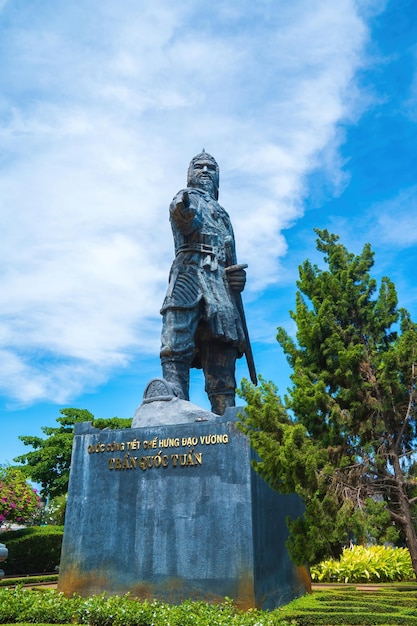 VUNG TAU MAR 13 2022 Tran Hung Dao statue in Vung Tau city in Vietnam Monument of the military leader on blue sky background