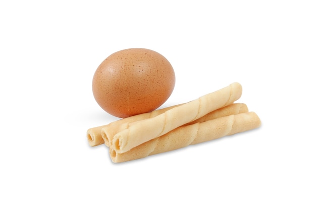 Wafer roll with raw egg isolated on white background