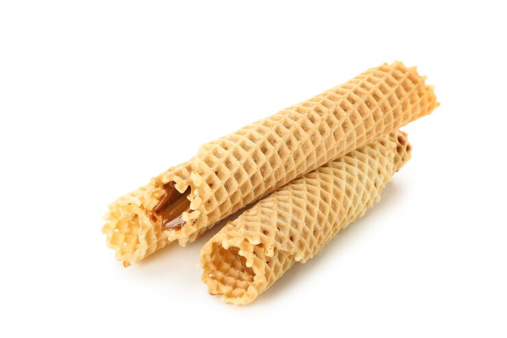 Photo wafer rolls with condensed milk isolated on white