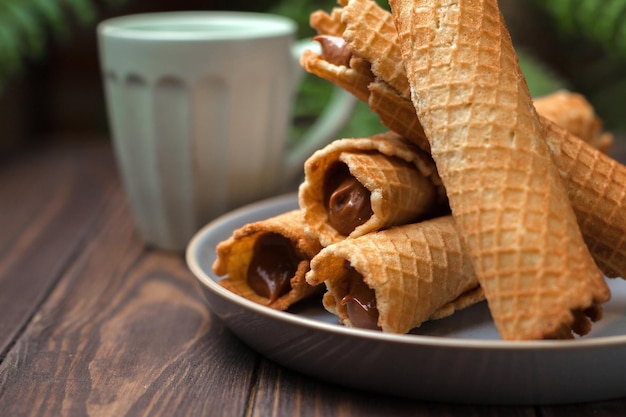 Photo wafer rolls with condensed milk thin and crispy waffle selective focus