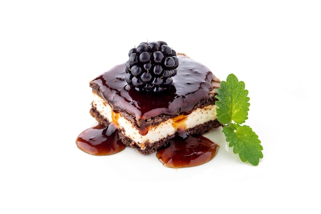 Waffle cake with blackberry and mint leaf isolated on white