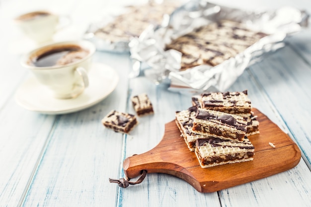 A waffle cake with caramel chocolate and walnuts Traditional slovak and czech cake grilaz