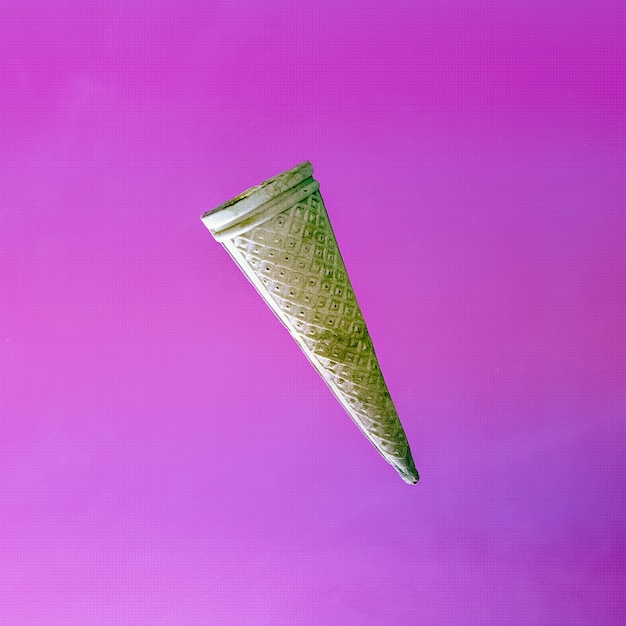 Waffle cone in pink atmosphere. Fashion Minimalism art