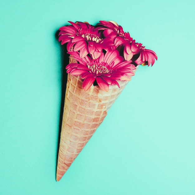 Waffle cone with flowers. minimalism art detail fashion