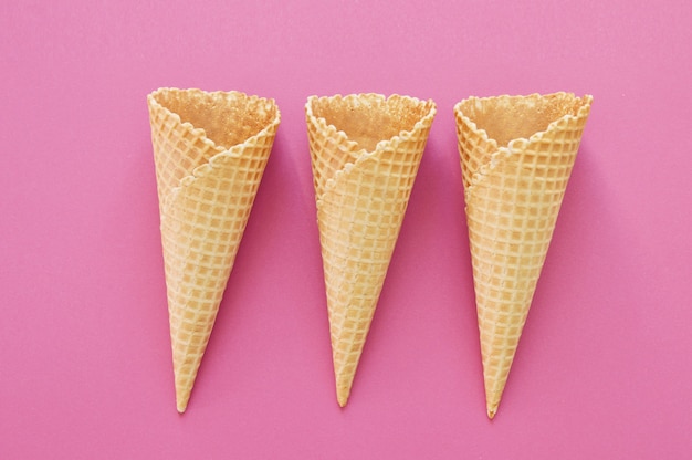 waffle cones on pink background