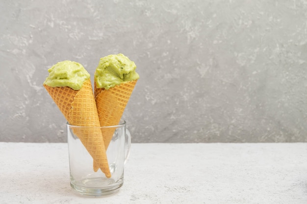 Waffle cones with healthy green avocado ice cream