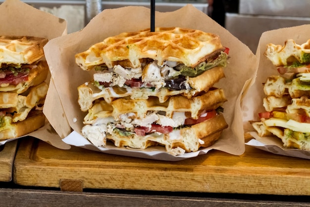 Waffle sandwich with stuffing in paper packaging