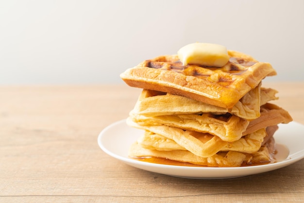 Waffle stack with butter and honey