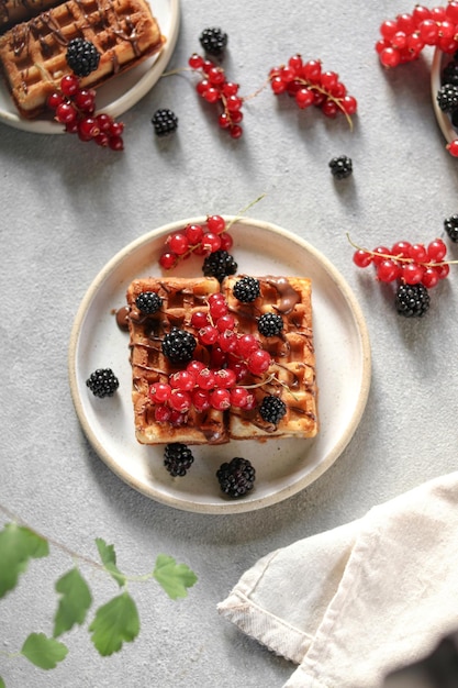 A waffle with berries on it