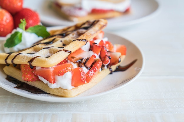 waffle with strawberry on wood