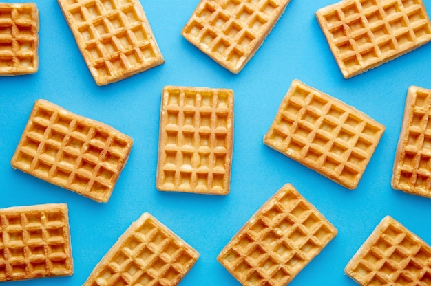 Waffles over blue background