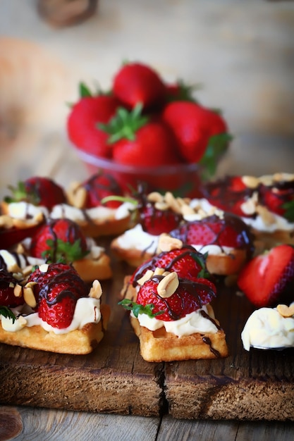 Waffles with cream cheese chocolate and strawberries