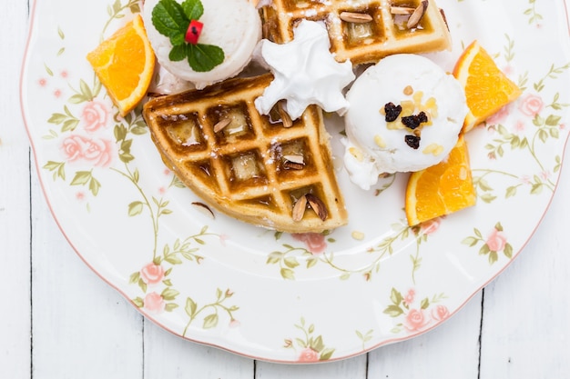 Waffles with ice cream and fruits