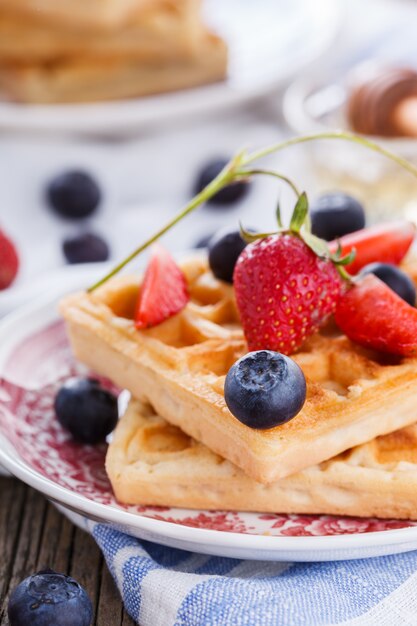 Waffles with strawberries and blueberries  