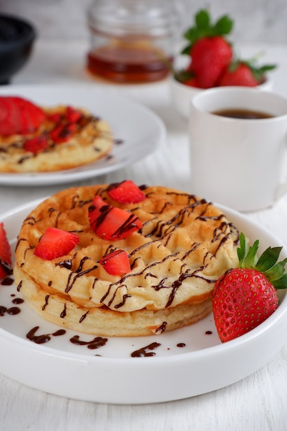 waffles with strawberry on white background