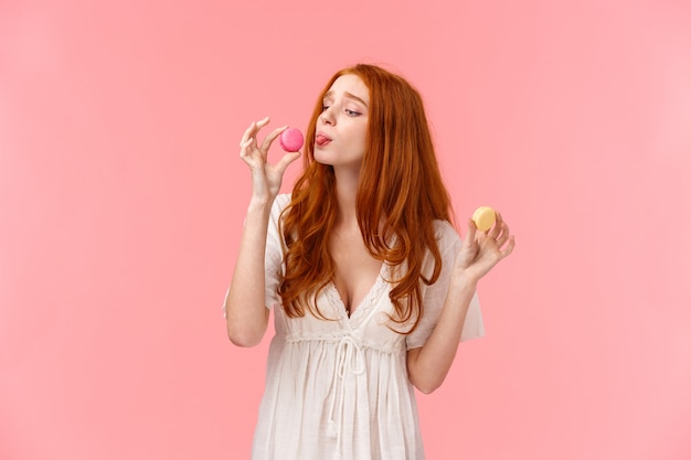 Waist-up portrait silly and cute redhead woman on diet, cant resist temptation, eager try dessert