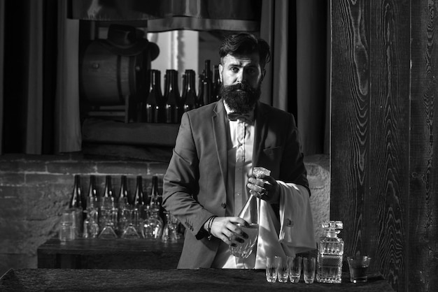 Waiter bartender in bar portrait of cheerful barman worker standing