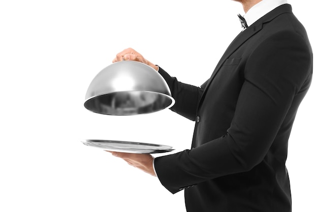 Photo waiter holding metal tray with cover on white background close up view