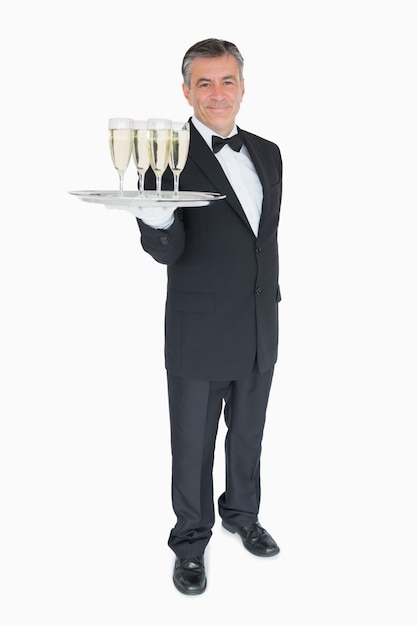 Photo waiter offering tray with glasses of champagne