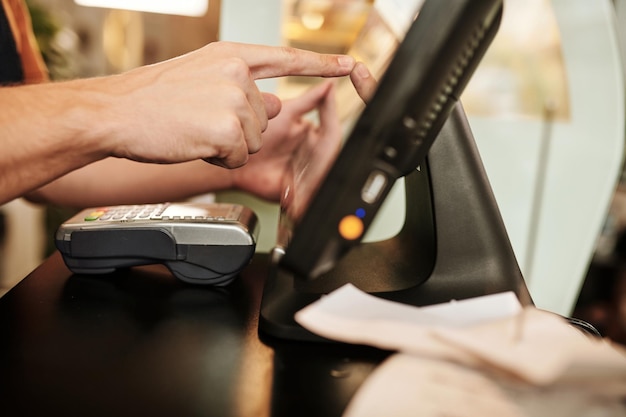 Waiter Sending Order to Kitchen