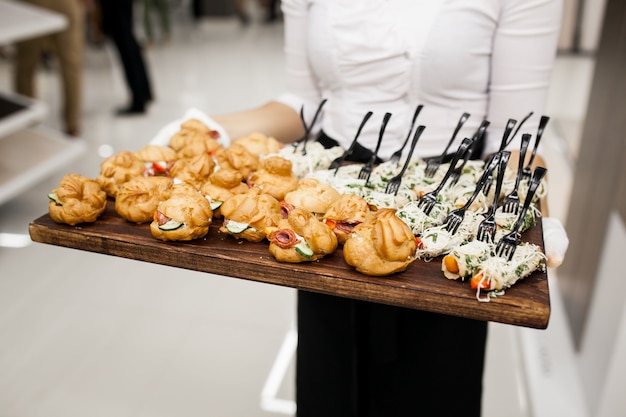 Waiter serving food