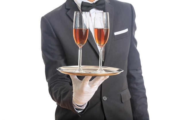 Photo waiter serving wine on a tray