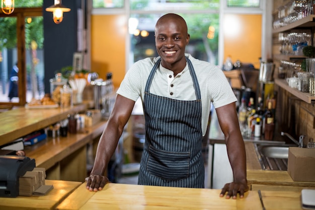 waiter standing at counter