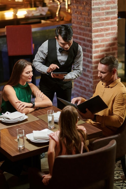 Waiter Taking Order