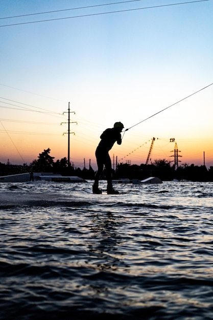 wakeboard. wakeboarding jumping at sunset