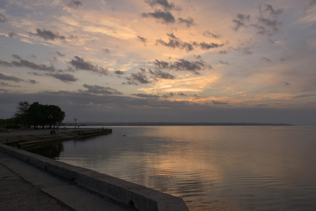 Walk at dawn along the embankment of the city of Kerch Russia seascape of a summer morning the concept of travel and recreation