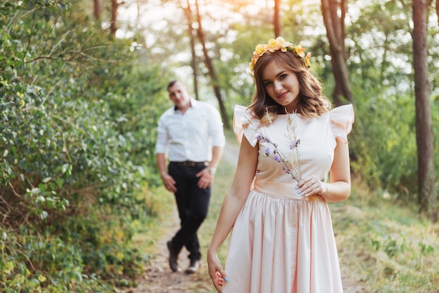 Walk a happy young couple on the nature