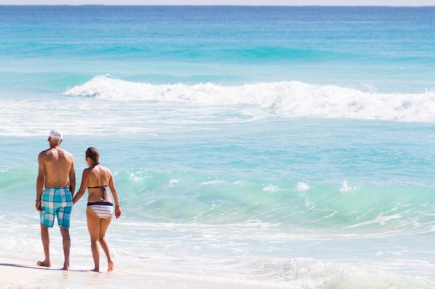 Walking on the beach of Mexico.