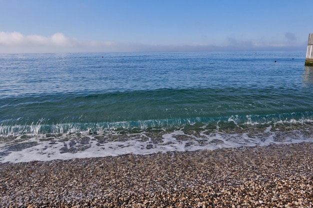 Walking on the shore of the Black Sea. Vacation at a recreation center near the seashore.